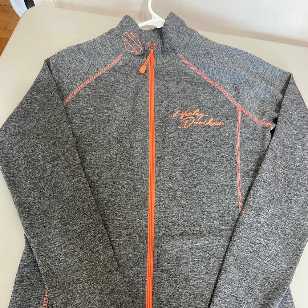 Women’s full zip Harley Davidsons performance fabric jacket. 100% polyester.